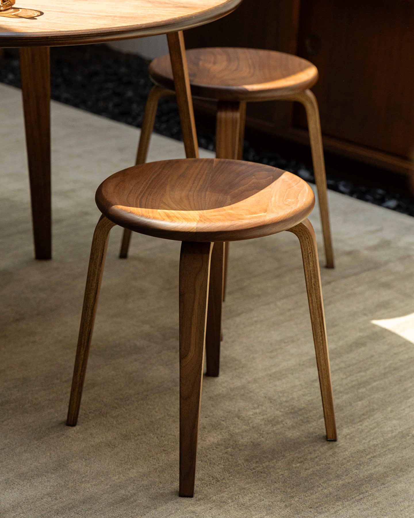 A close view of the Bistro stools in walnut.