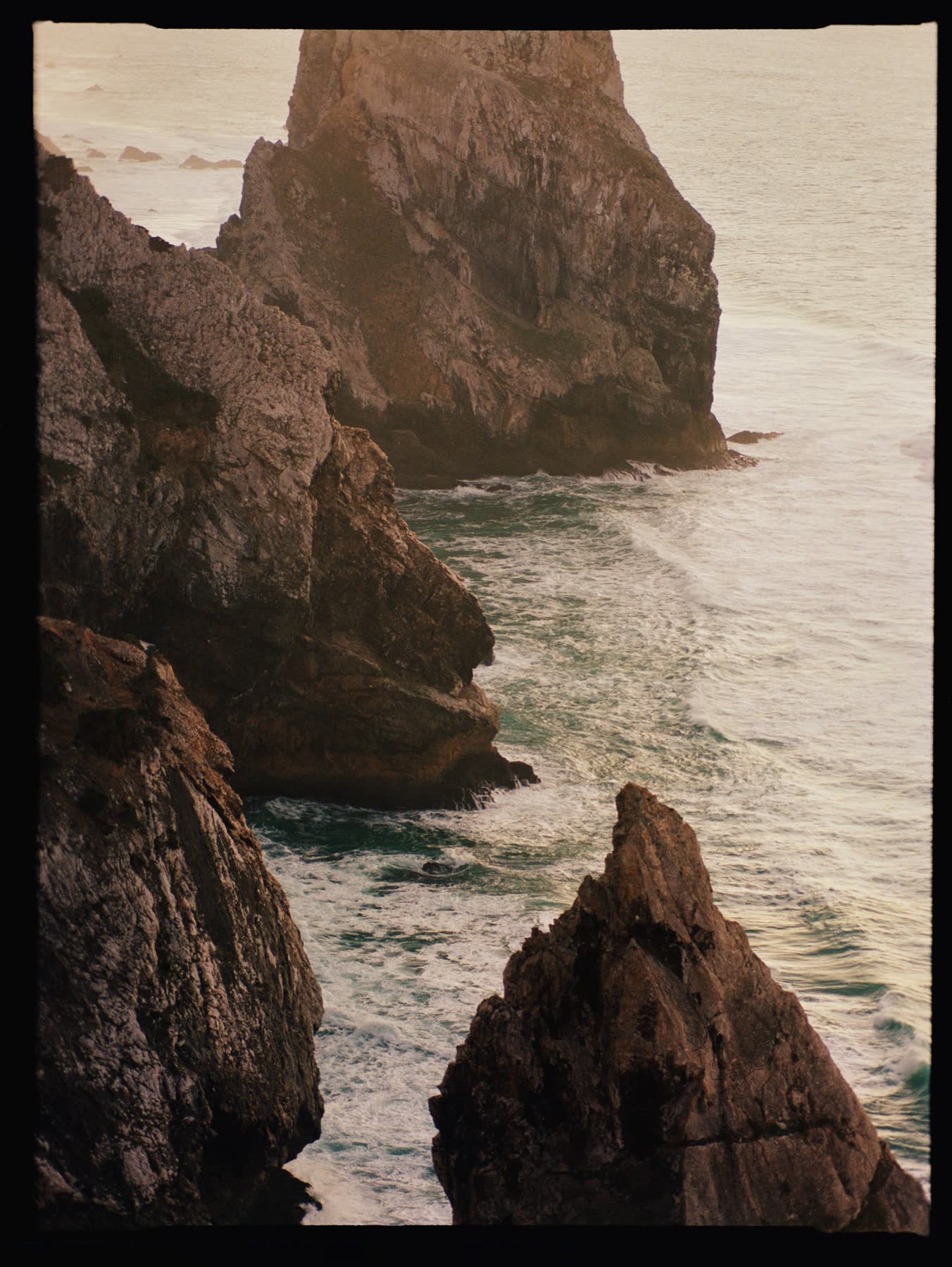 Rocky cliffs and waves along the Atlantic coast at Cabo da Roca.