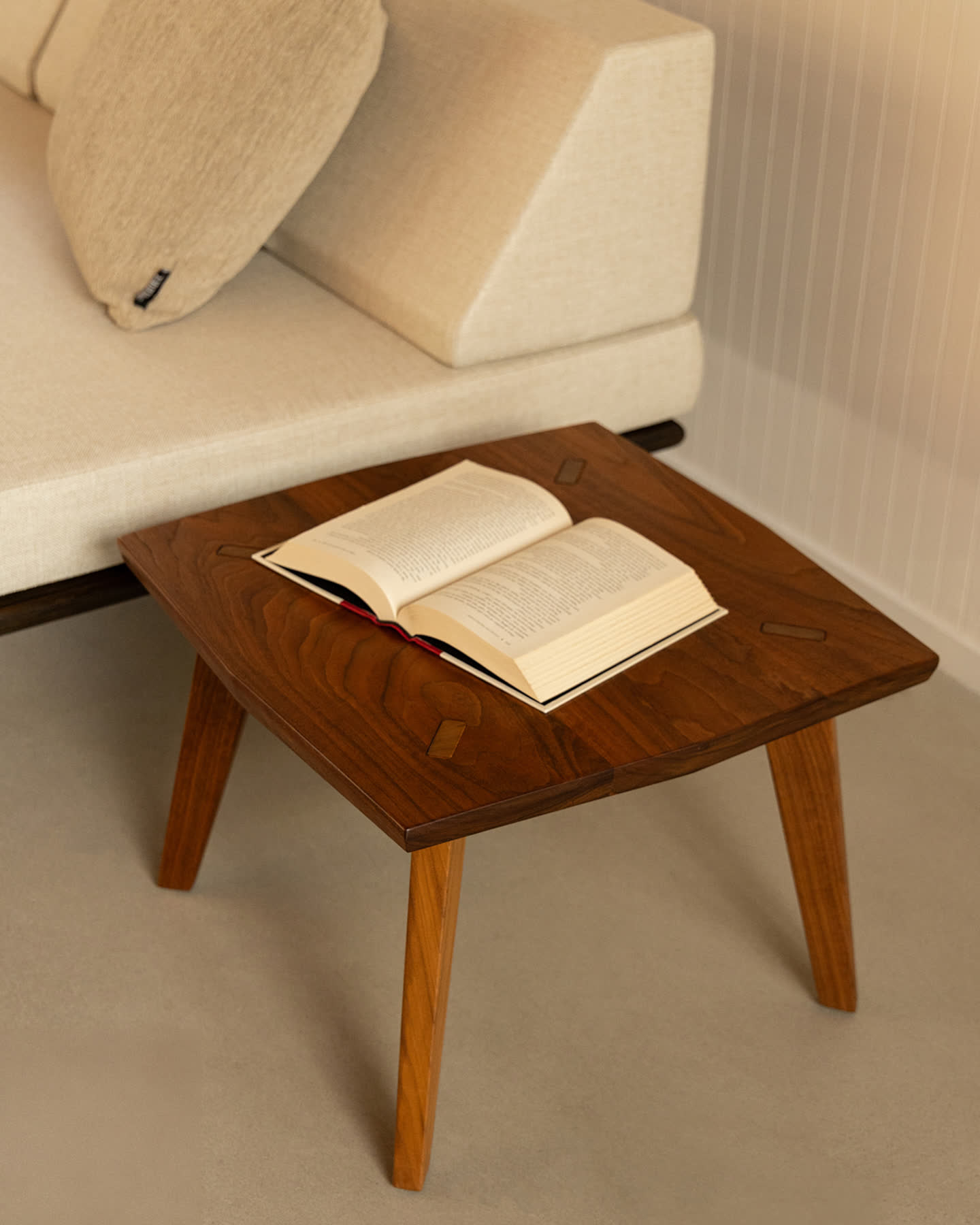 A Modernica sofa and coffee table in the Eichler Post & Beam living room.