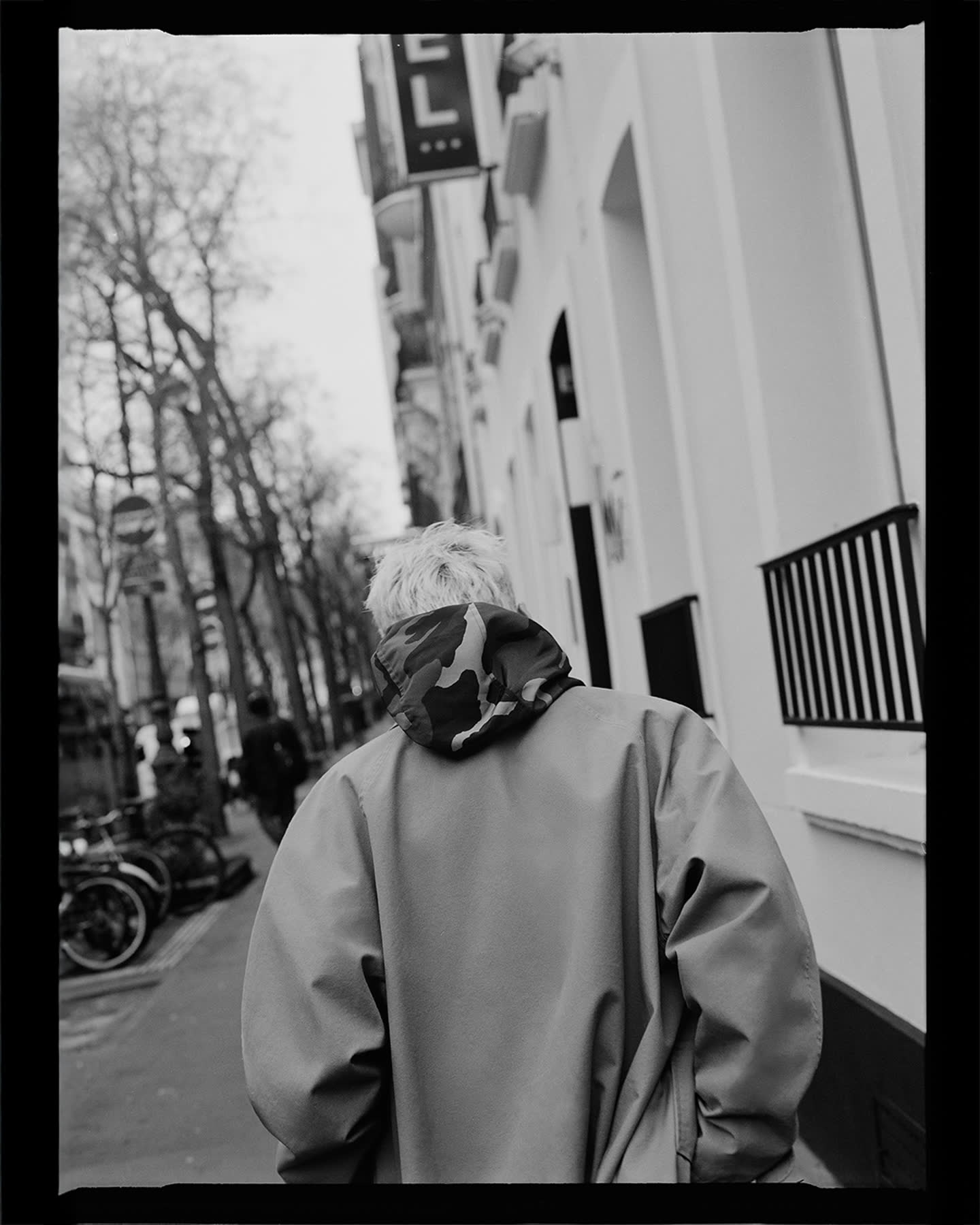 Henri Pier walking through Paris in winter for Flâneur.