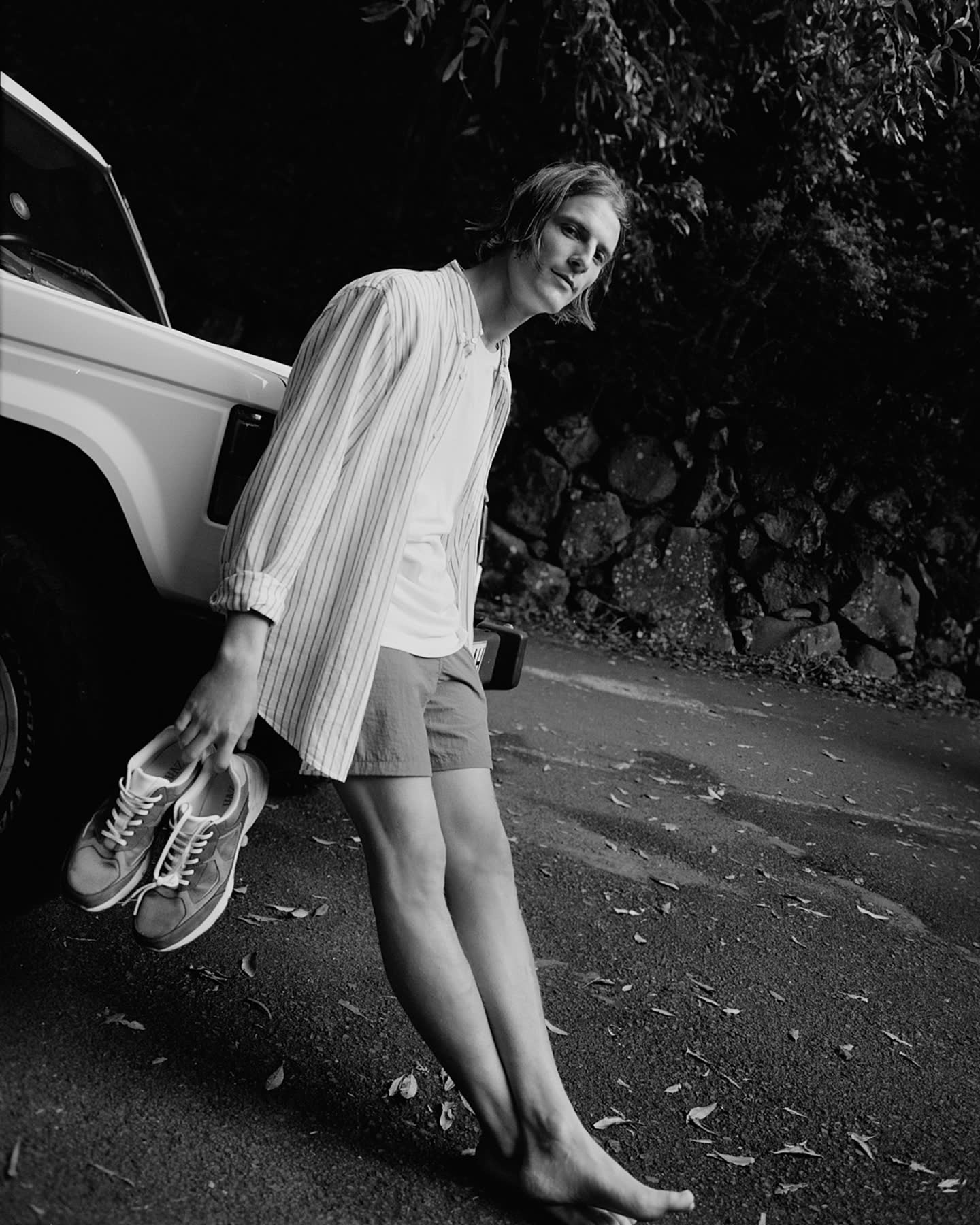 Victor Le Dauphin photographed beside a vehicle on La Palma for Zara.