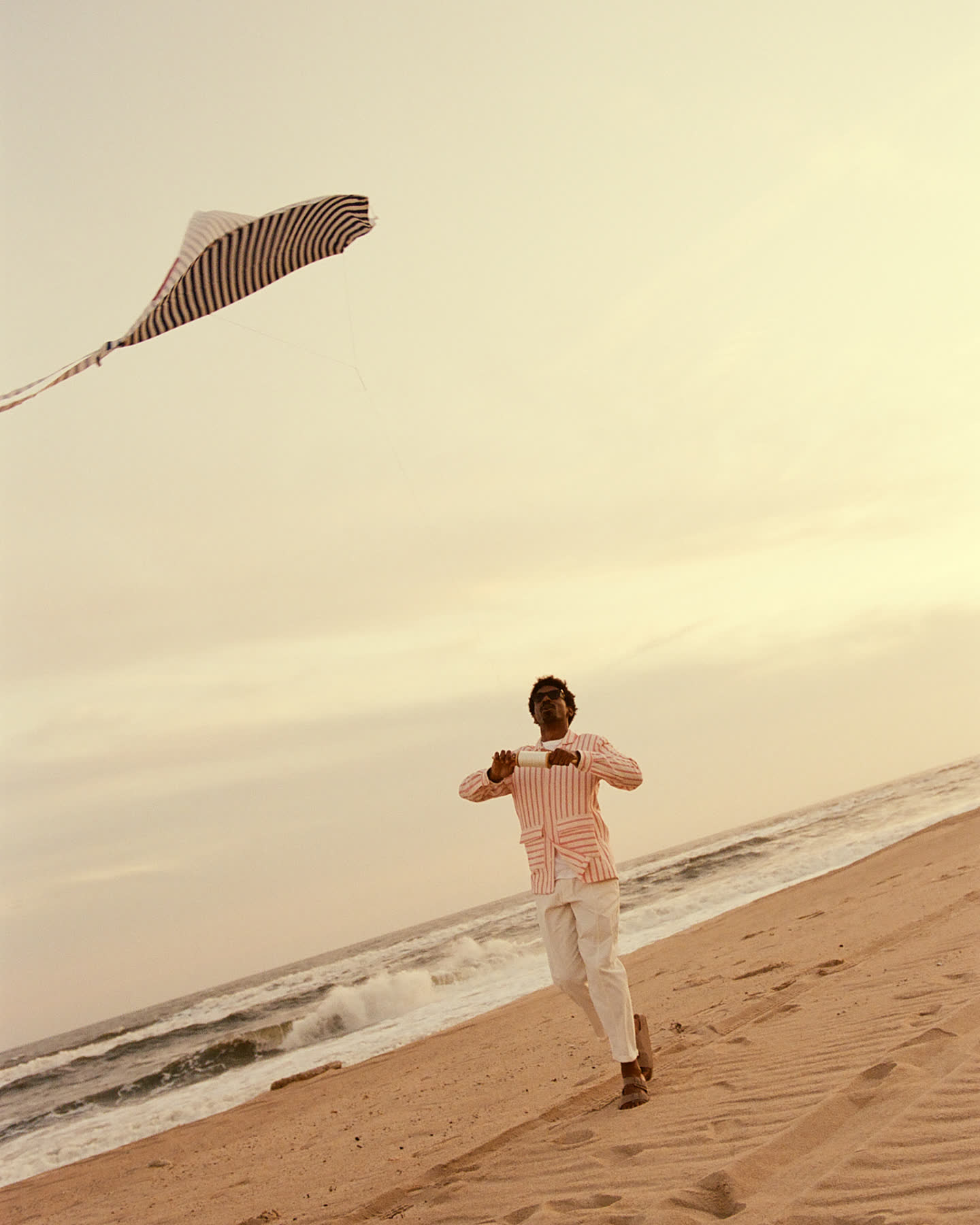 Montauk by Zara, photographed on a beach at golden hour.