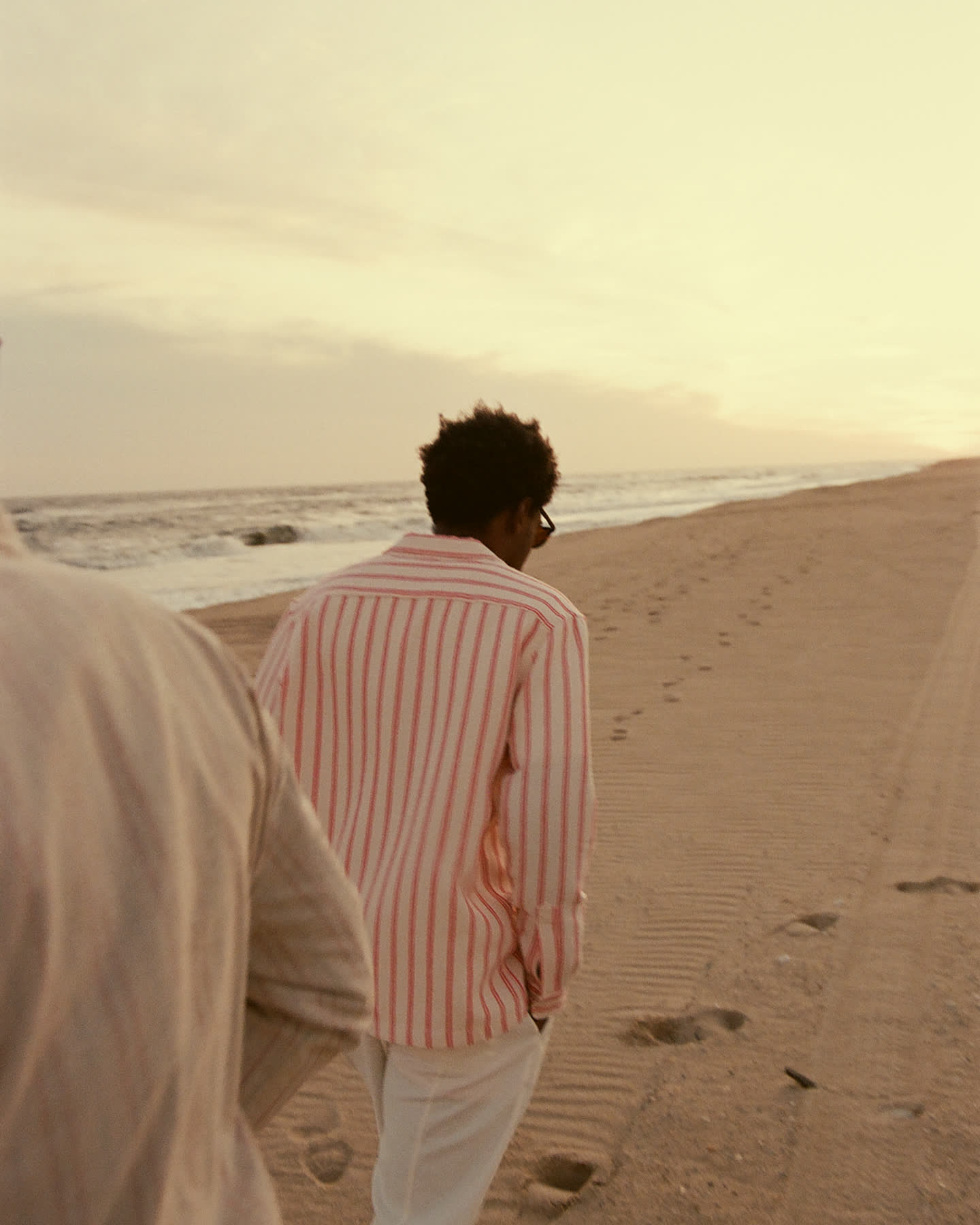 Angel Number 8 walking down the beach in Montauk for Zara.