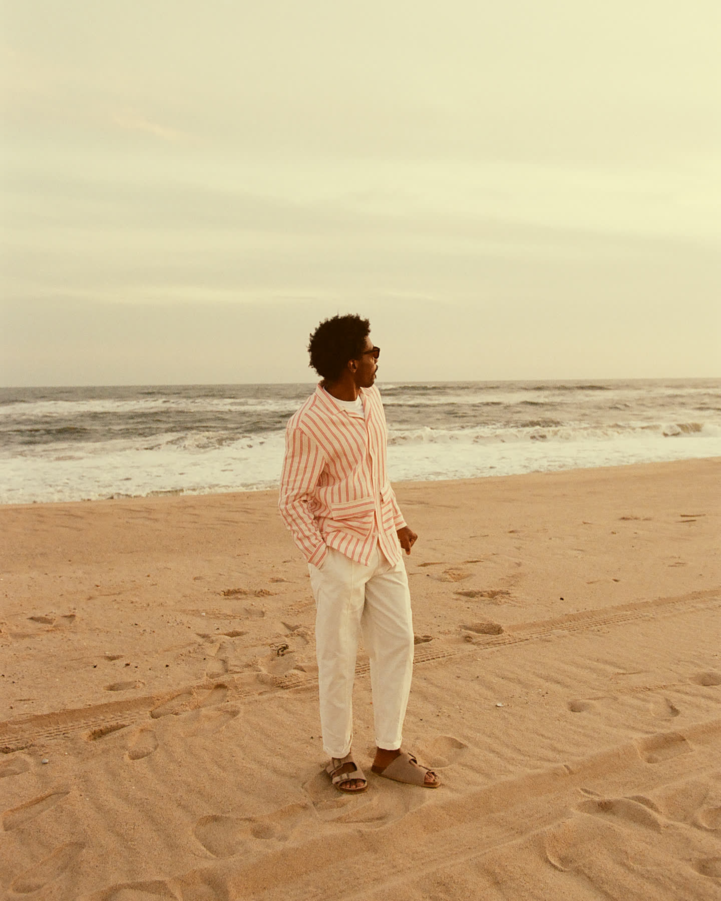 Angel Number 8 walking along the beach in Montauk for Zara.