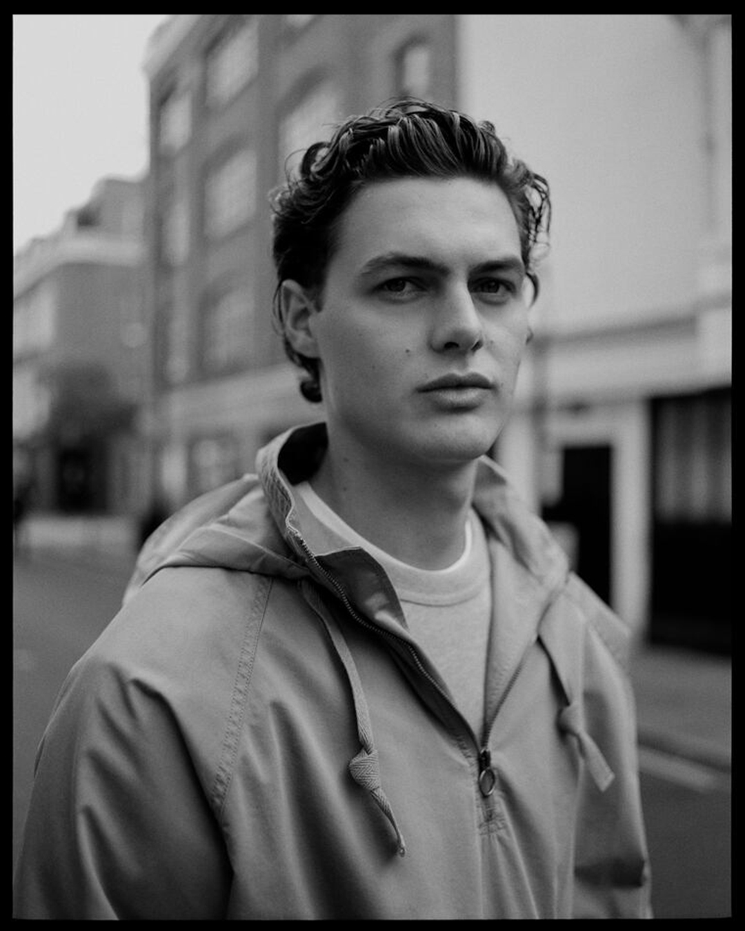 Black-and-white portrait of Darwin Gray in London for Portobello Road.