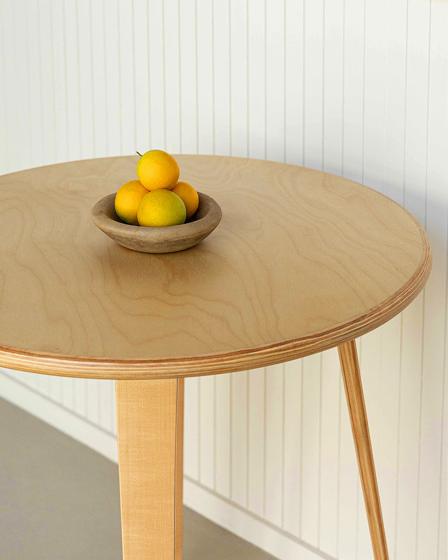 Close view of the maple Bistro Collection table and its layered wood edge for Sunroom.
