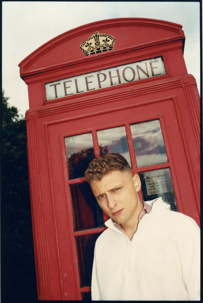 Blondey McCoy beside a red telephone box in London for Zara.